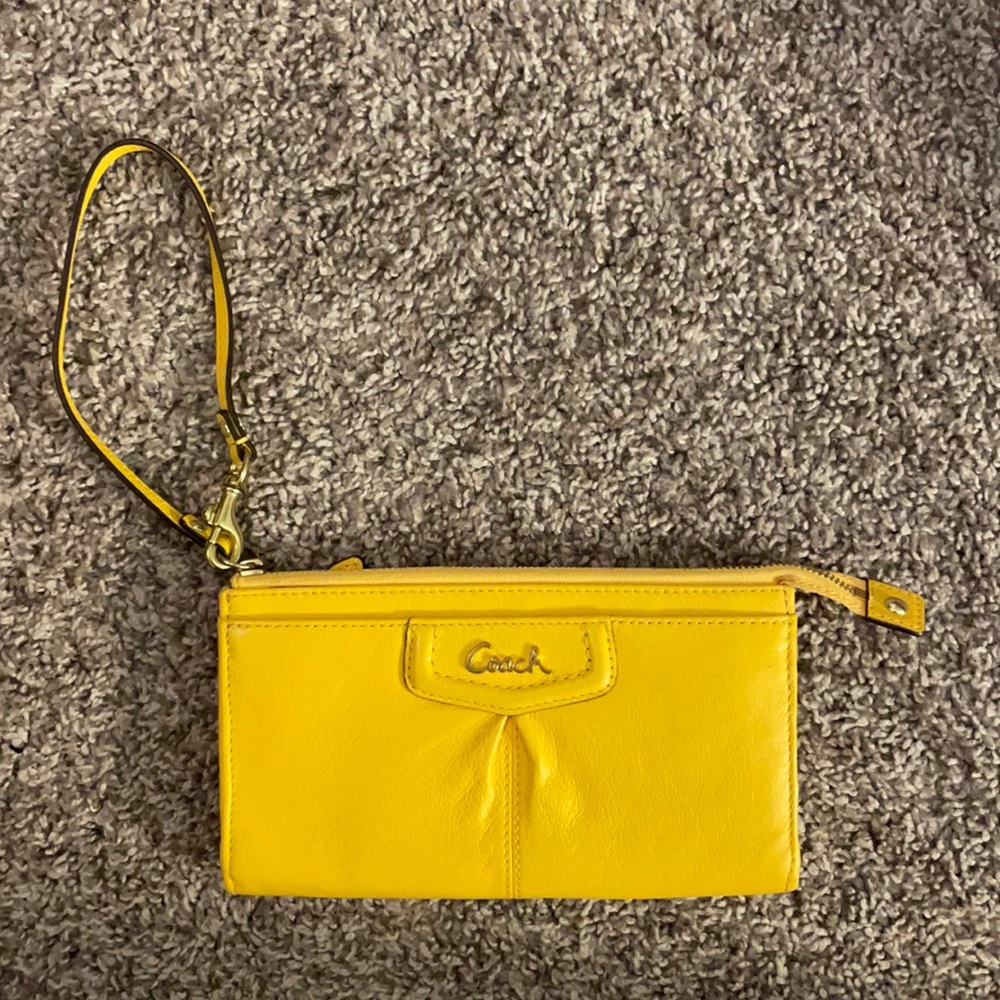 COACH yellow wristlet/wallet
